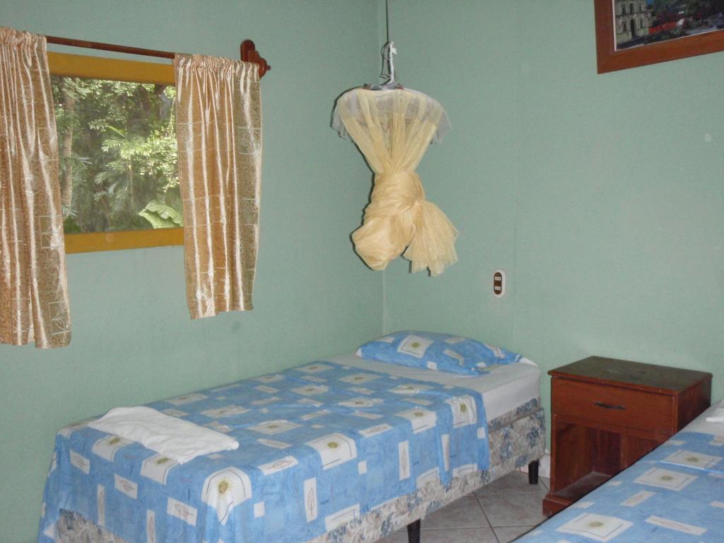 Guest House Posada Ixchel El Remate Bagian luar foto